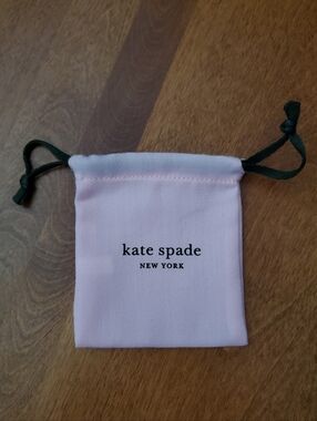 kate spade Pink Drawstring Jewelry Pouch with Green Cords